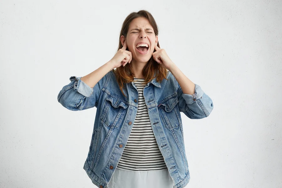 stressed-nervous-young-woman-shouting-despair-fury