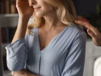 portrait woman being comforted therapy office